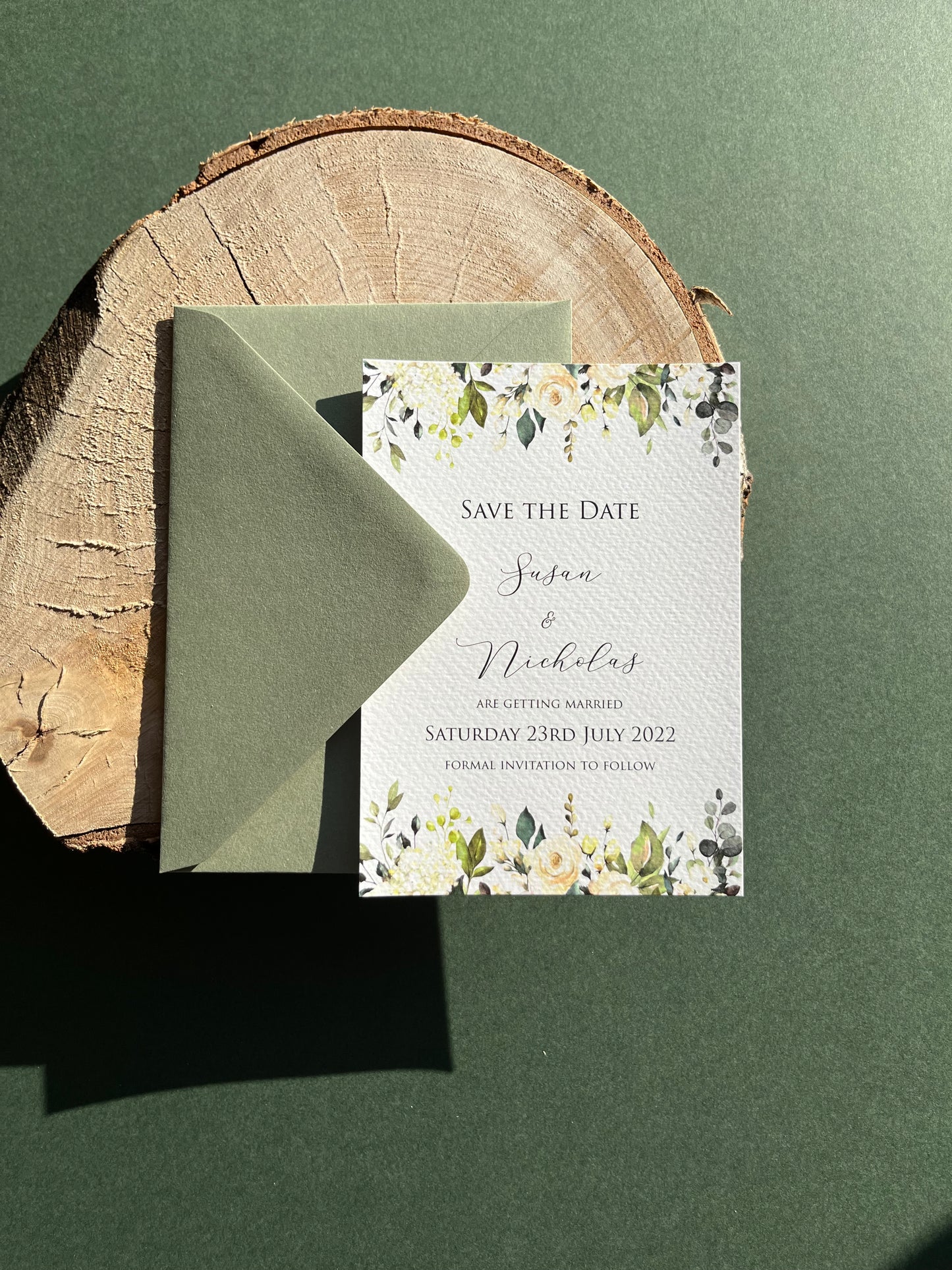 Green and white floral save the date