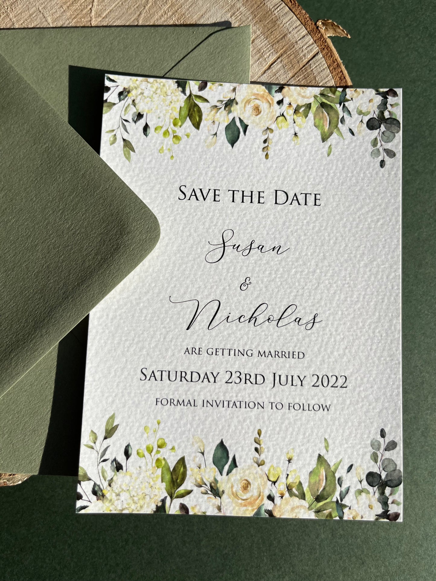 Green and white floral save the date