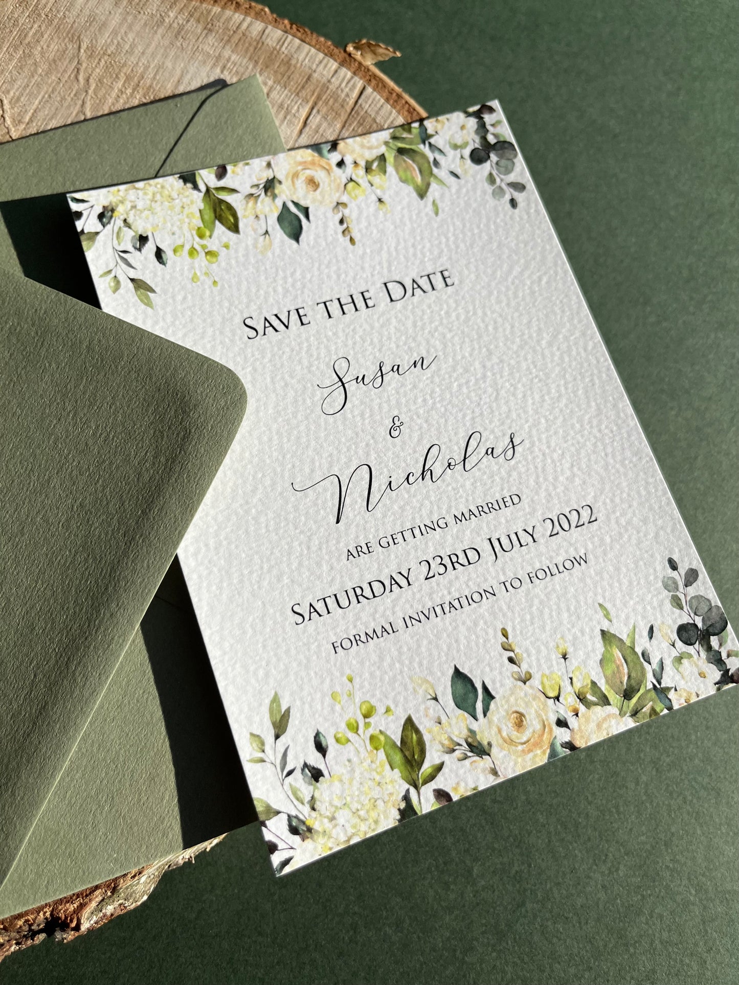 Green and white floral save the date