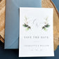 Greenery design save the date with dusty blue envelopes