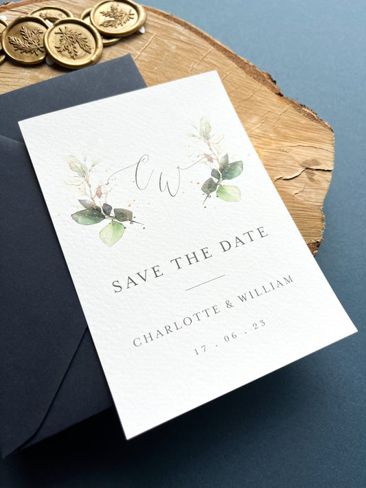 Navy and greenery design save the date