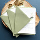 Sage green save the date with monogram greenery design